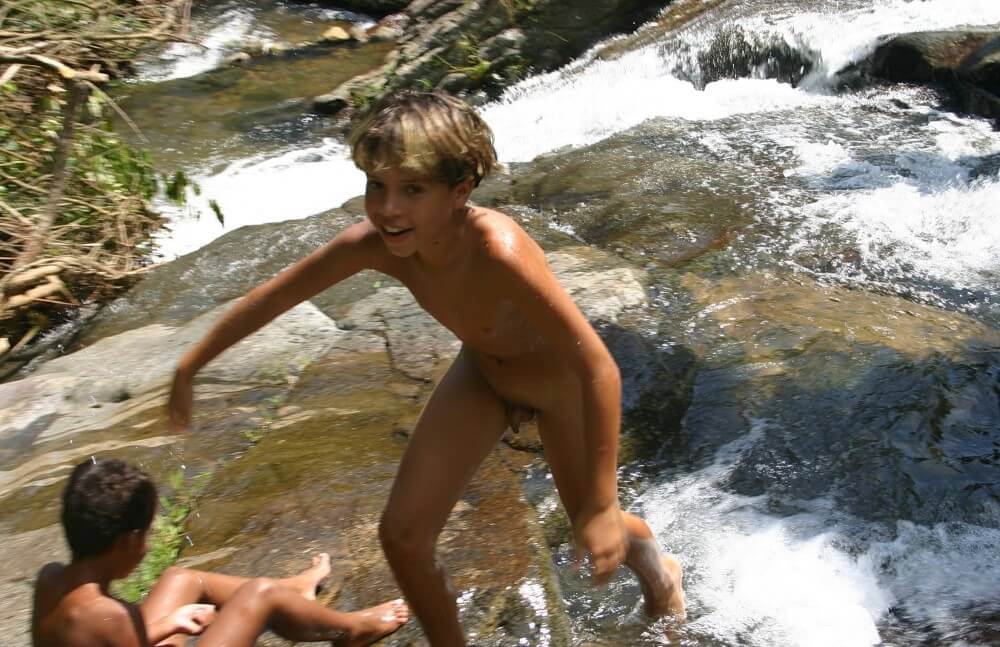 Brazilian Cliff Slide pics - People seek self-development and peace of mind through nudism