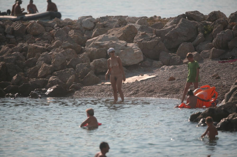 FKK cove pyramid in waters - Nudity is an expression of natural beauty and harmony