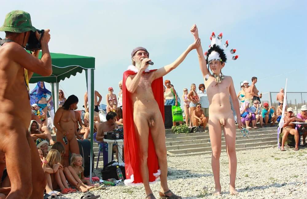 Native Headdress Dance pics - A well-known naturist center