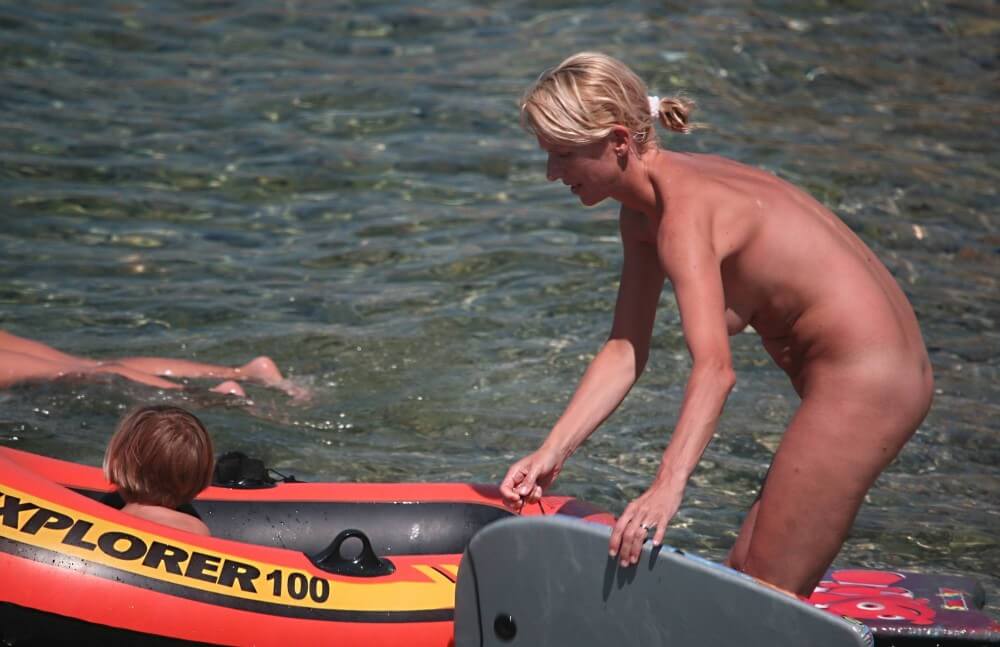 Red Boating for Two Nudists pics - Respect for differences is valued in the nudist movement