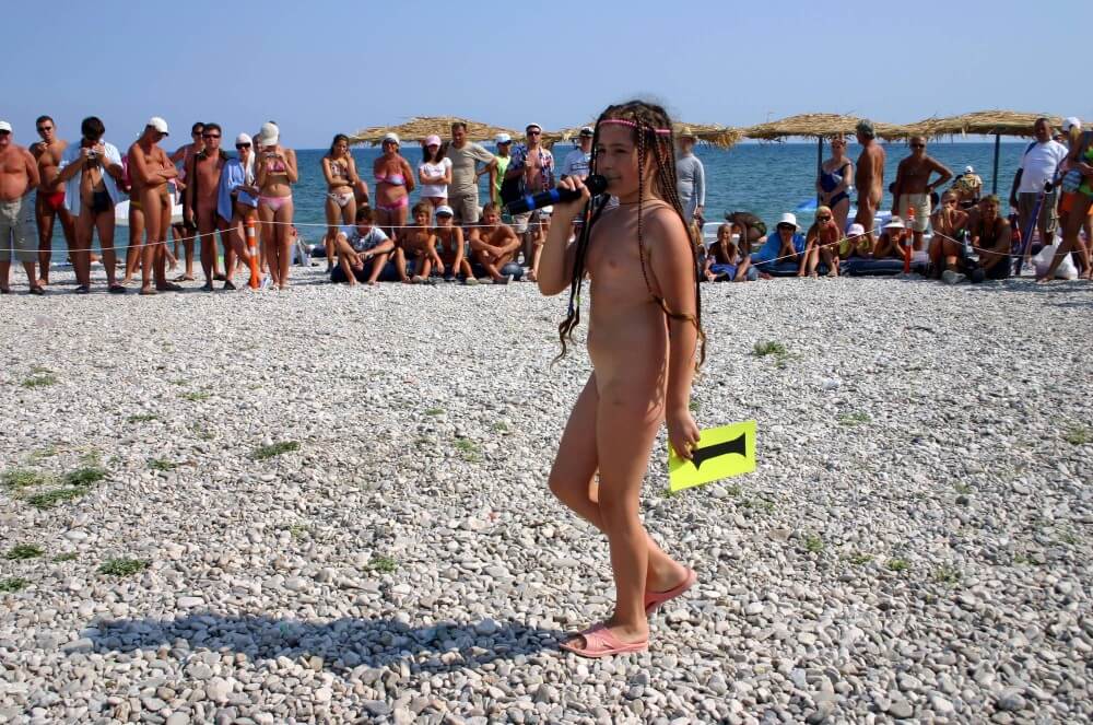 Naturist Mic Speech photos - Nature serves as the bodys natural clothing