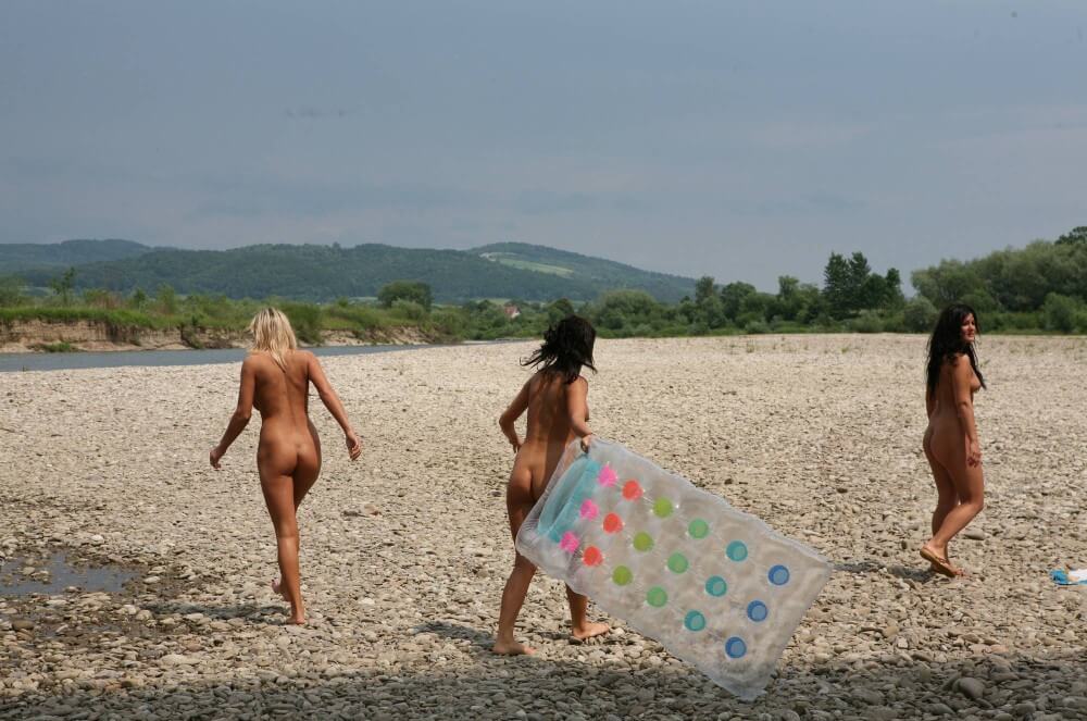 Naturist Park Floating On River photos - Human nature in its original form