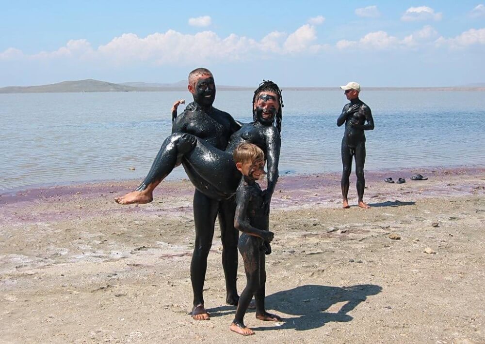 Dark Mud And Clear Water pics - Only a nudist truly values the connection with nature and the human body