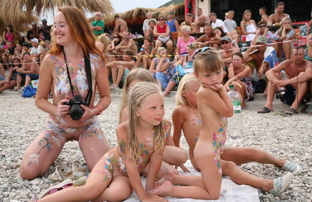 Warm Sand Relaxation photos - Values trust and friendliness among naked people
