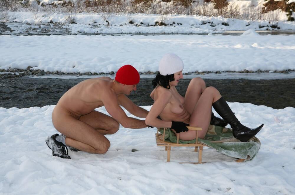 Naturist Girl Snow Day Couples Sled pics - Undressing is permissible only within ones own community