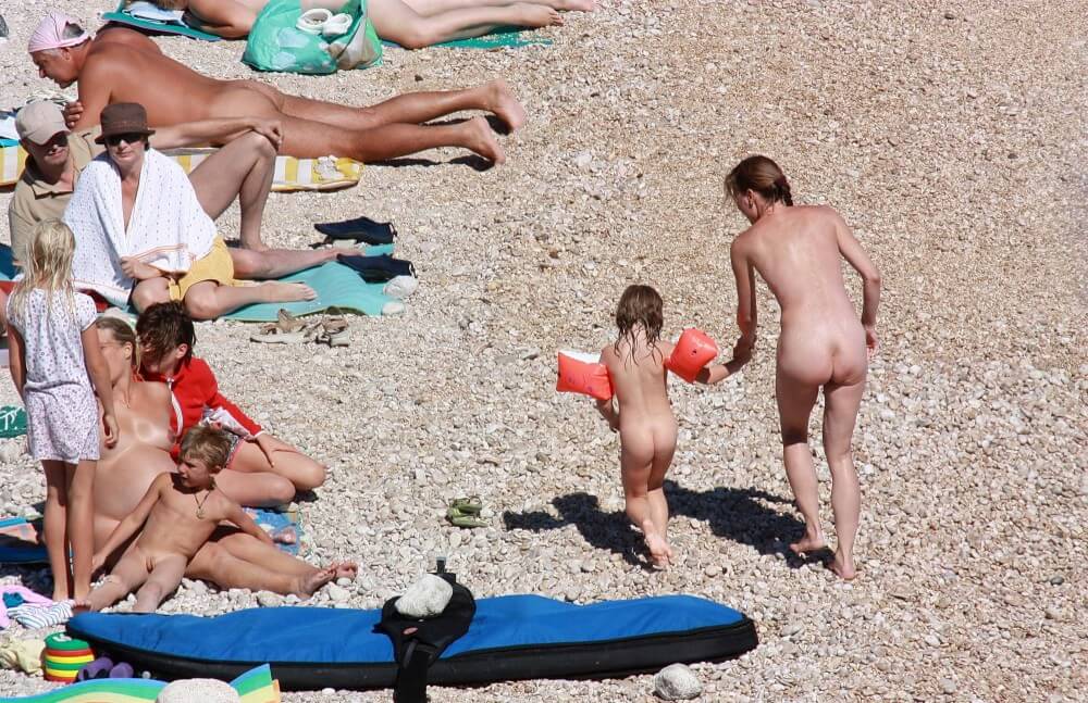 Orange Floaty Safety First Naturist pics - Love for oneself and nature is the foundation of the naturist and nudist lifestyle