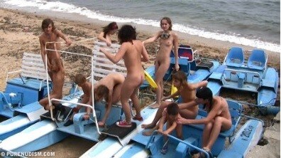 A group of naturists at sea - The True Golden Age of Naturism